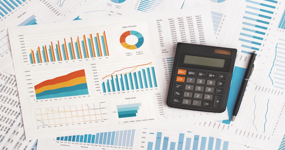Business graphs, charts and calculator on table. Financial development, Banking Account, Statistics